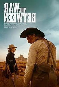 The war between poster. Two cowboys standing in desert.